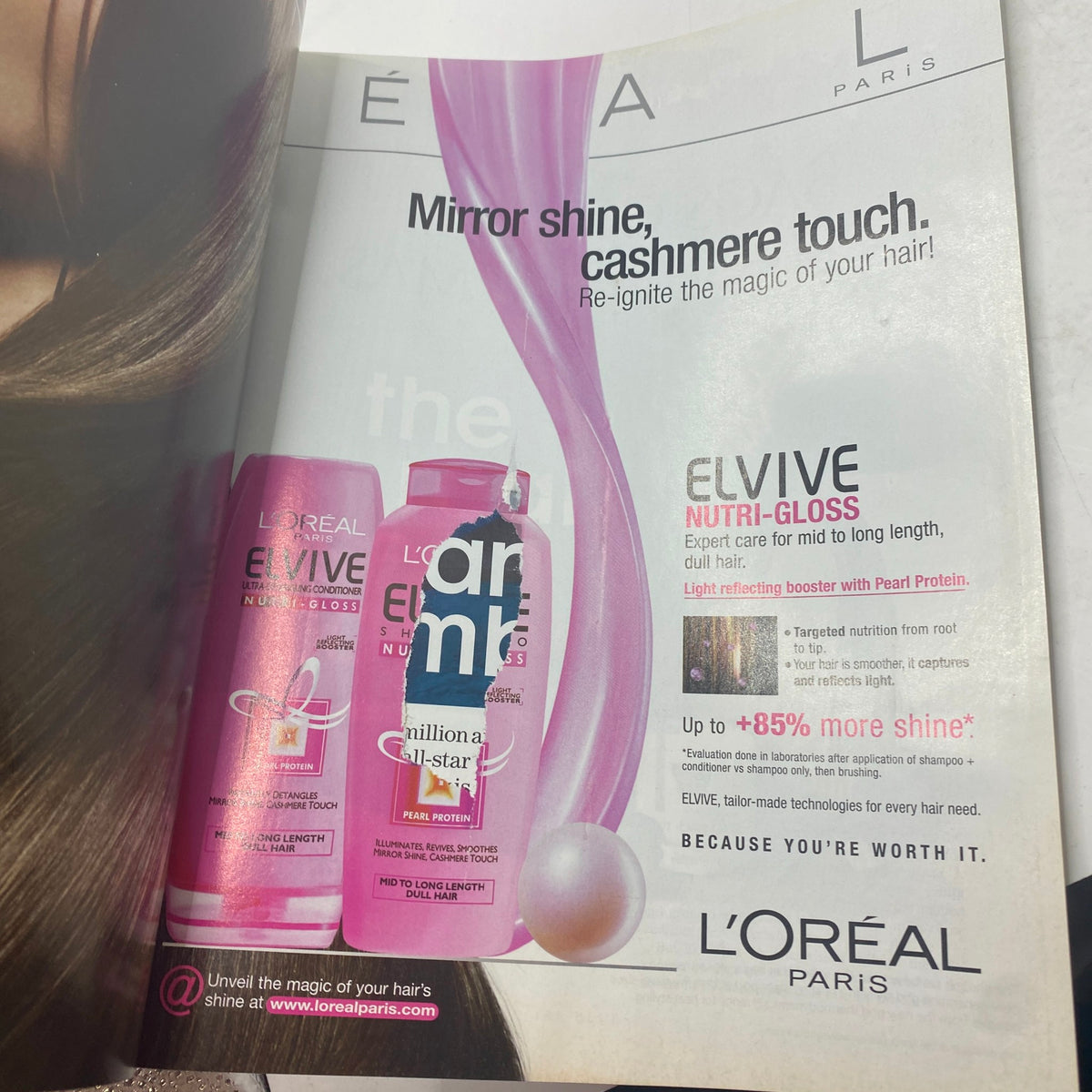 Inside page from Elle UK Magazine December 2006 with a L'Oréal ad promoting Elvive Nutri-Gloss for shiny hair.