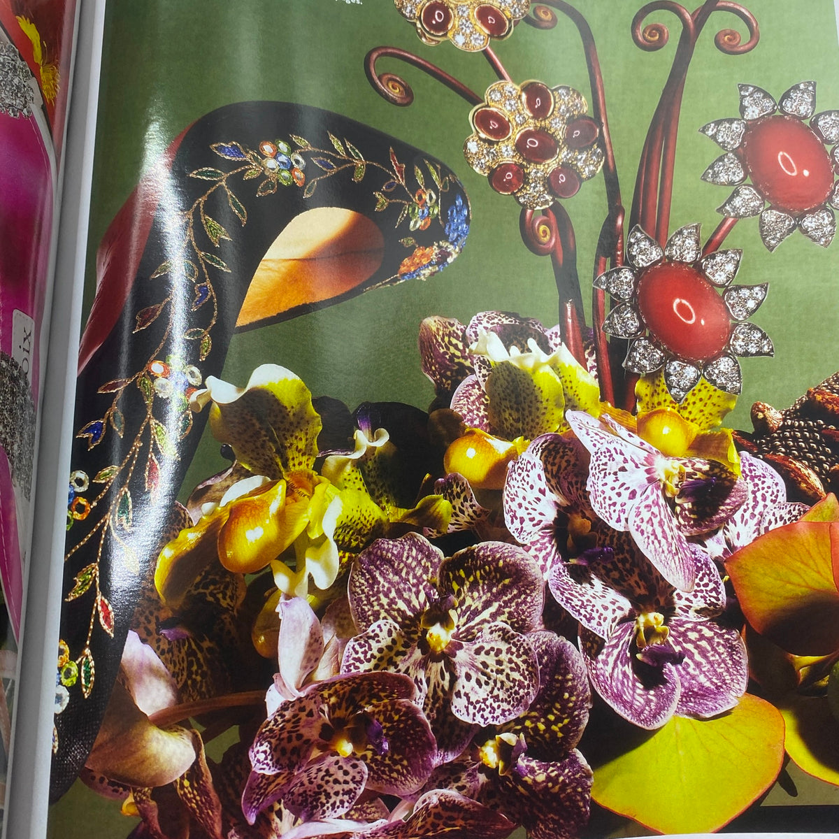 Wynn Magazine Spring 2006 featuring a stunning display of colorful orchids and high-fashion accessories, showcasing luxurious jewelry on a vibrant backdrop.