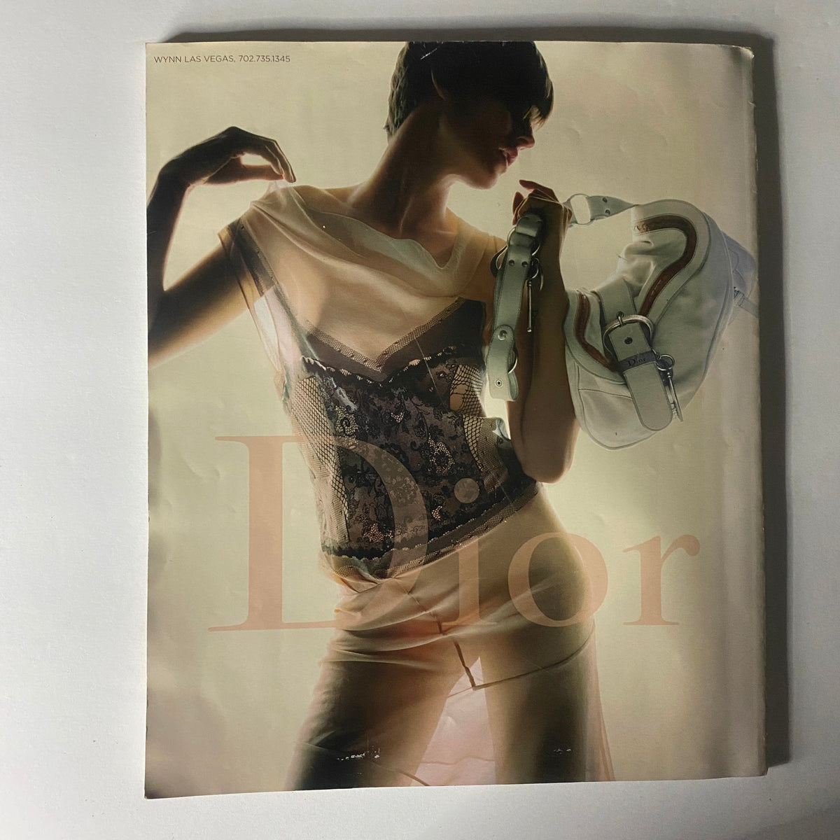 Wynn Magazine Spring 2006 cover highlighting a model in stylish attire, featuring a Dior logo, capturing the essence of high fashion in Las Vegas.