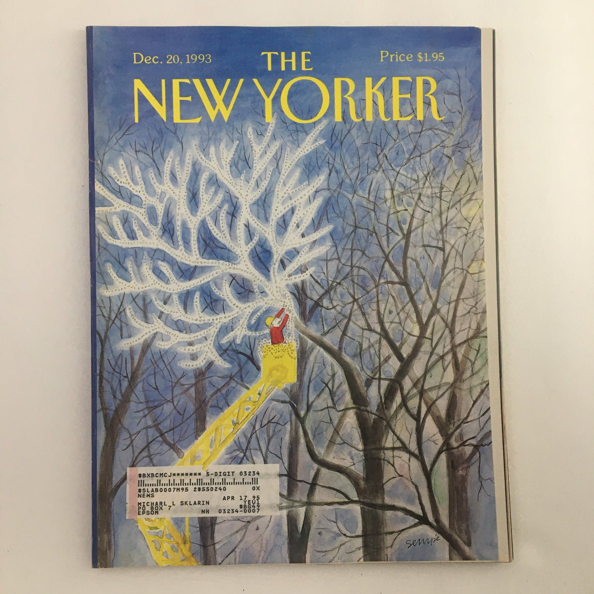 The New Yorker Full Magazine December 20 1993 cover featuring whimsical artwork titled 'All Lit Up' by Jean-Jacques Sempe, showcasing a snowy landscape with a tree and a character in a yellow lift.