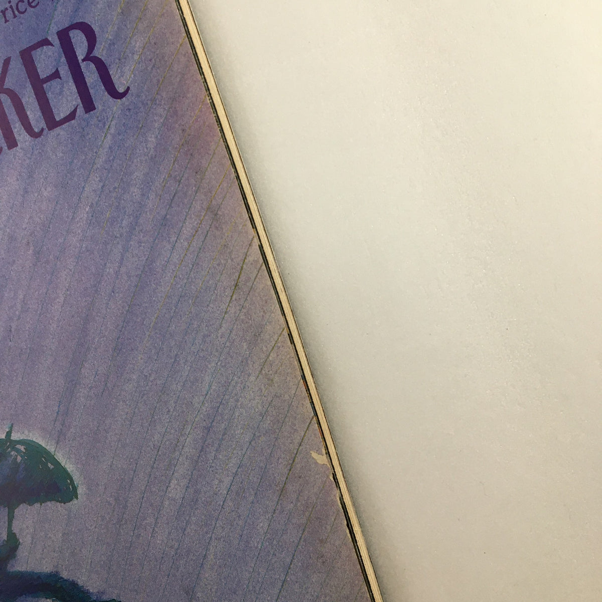Close-up view of the cover of The New Yorker magazine, April 29, 1985, highlighting the magazine title and date, with a soft purple color scheme.