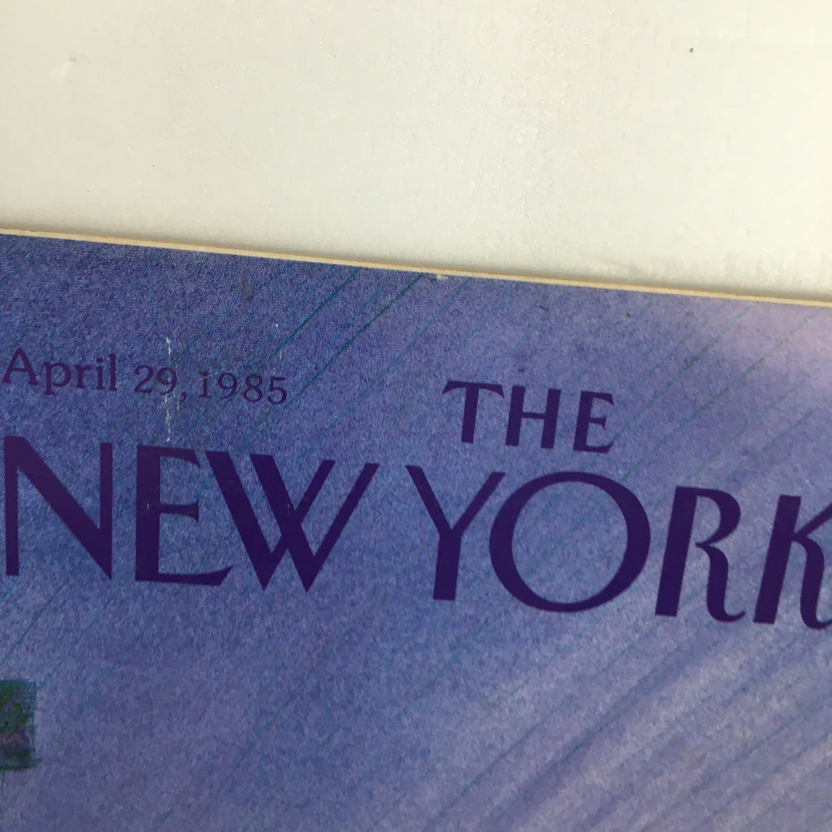 Detailed close-up of the magazine title on the cover of The New Yorker, April 29, 1985, featuring the logo and date in artistic typography.