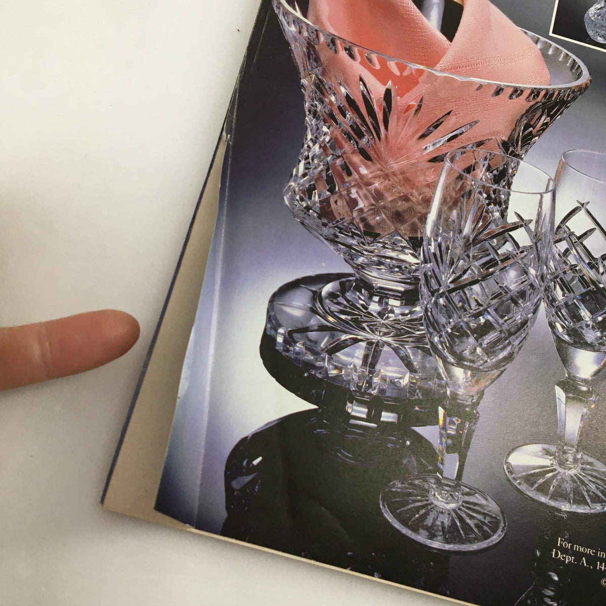 Interior page of The New Yorker magazine, April 29, 1985, displaying a stylish crystal glassware advertisement, showing the elegance of vintage design.