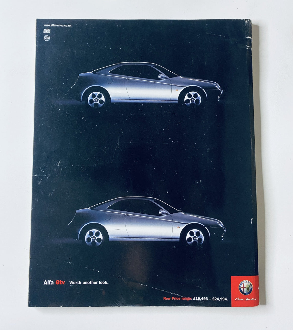 Back cover of CAR Magazine January 2001 featuring an advertisement for the Alfa GTV, highlighting its design and features.