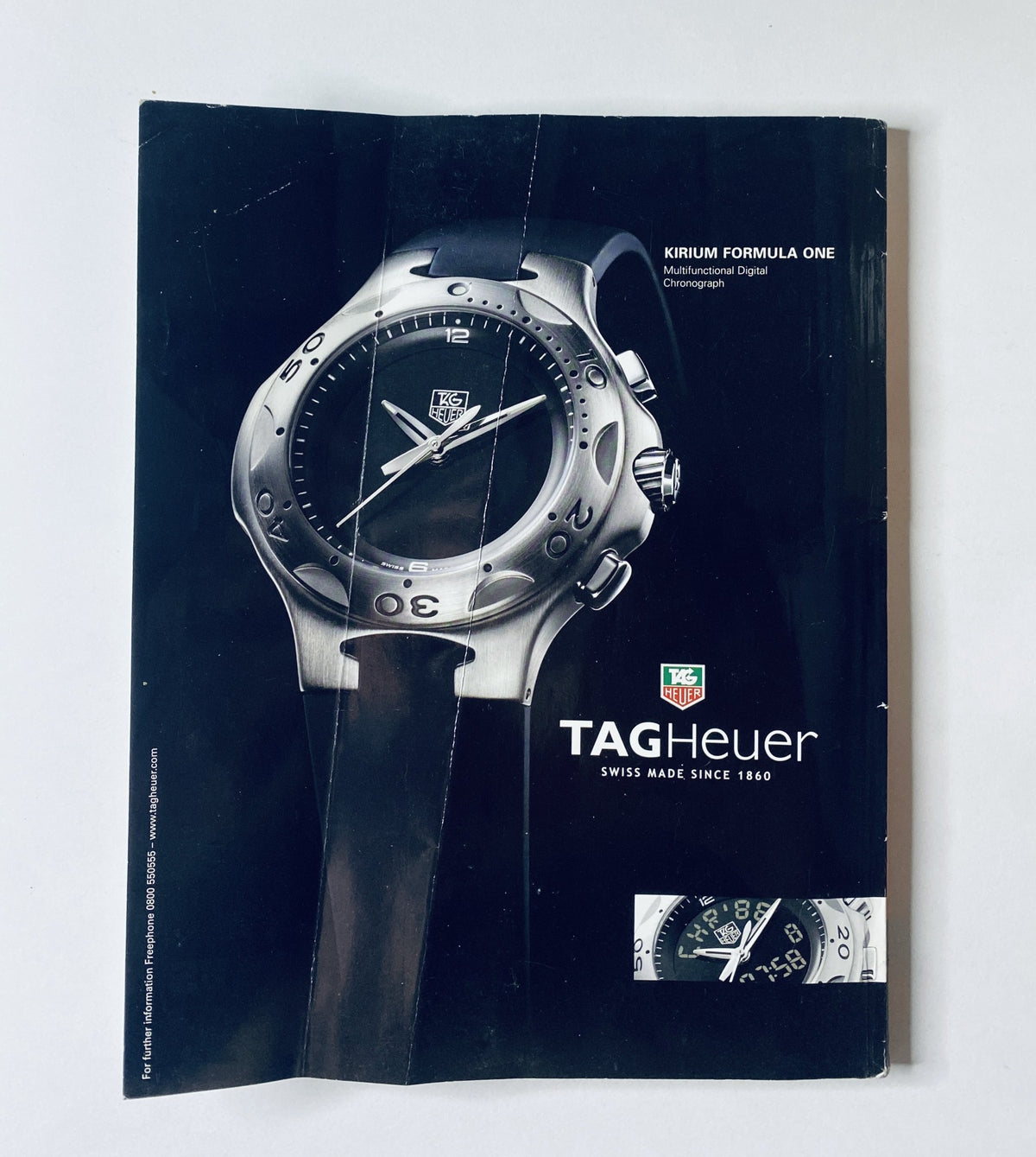 Advertisement for TAG Heuer watch featured in CAR Magazine Nov 2001, showcasing the KRIKUM Formula One model.