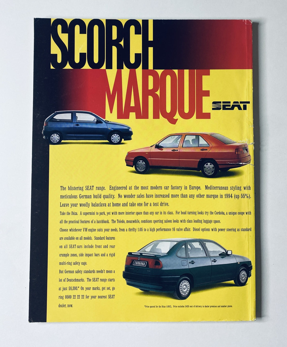 Cover of CAR Magazine July 1995 featuring Alfa GTV, Spider, and BMW 318i, along with reviews of Damon Hill and the E-Class. The vibrant design showcases various car models, highlighting automotive culture and reviews from that period.