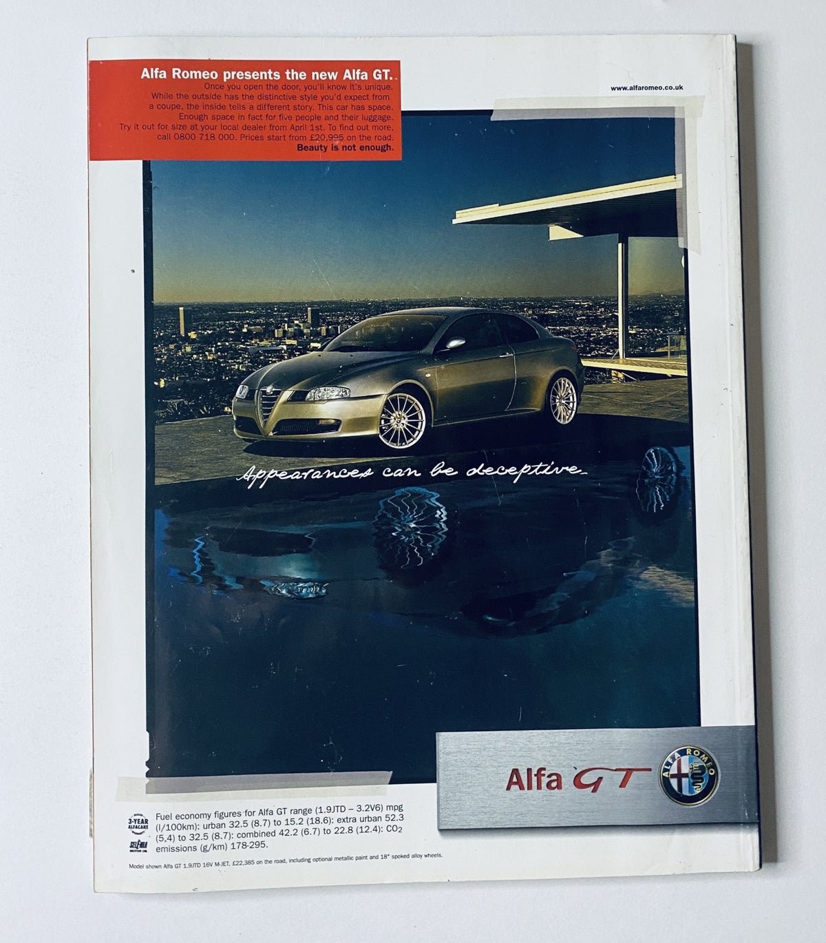 Back cover of CAR Magazine April 2004 featuring an advertisement for the Alfa Romeo GT with the tagline 'Appearances can be deceptive.'