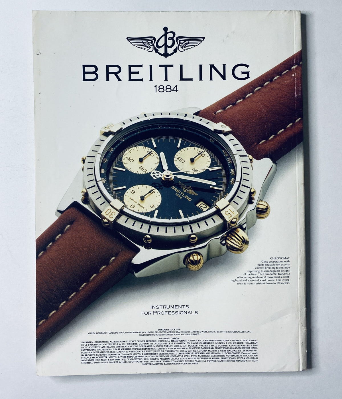 Advert page in CAR Magazine December 1992 featuring a Breitling 1884 watch with a stylish leather strap.