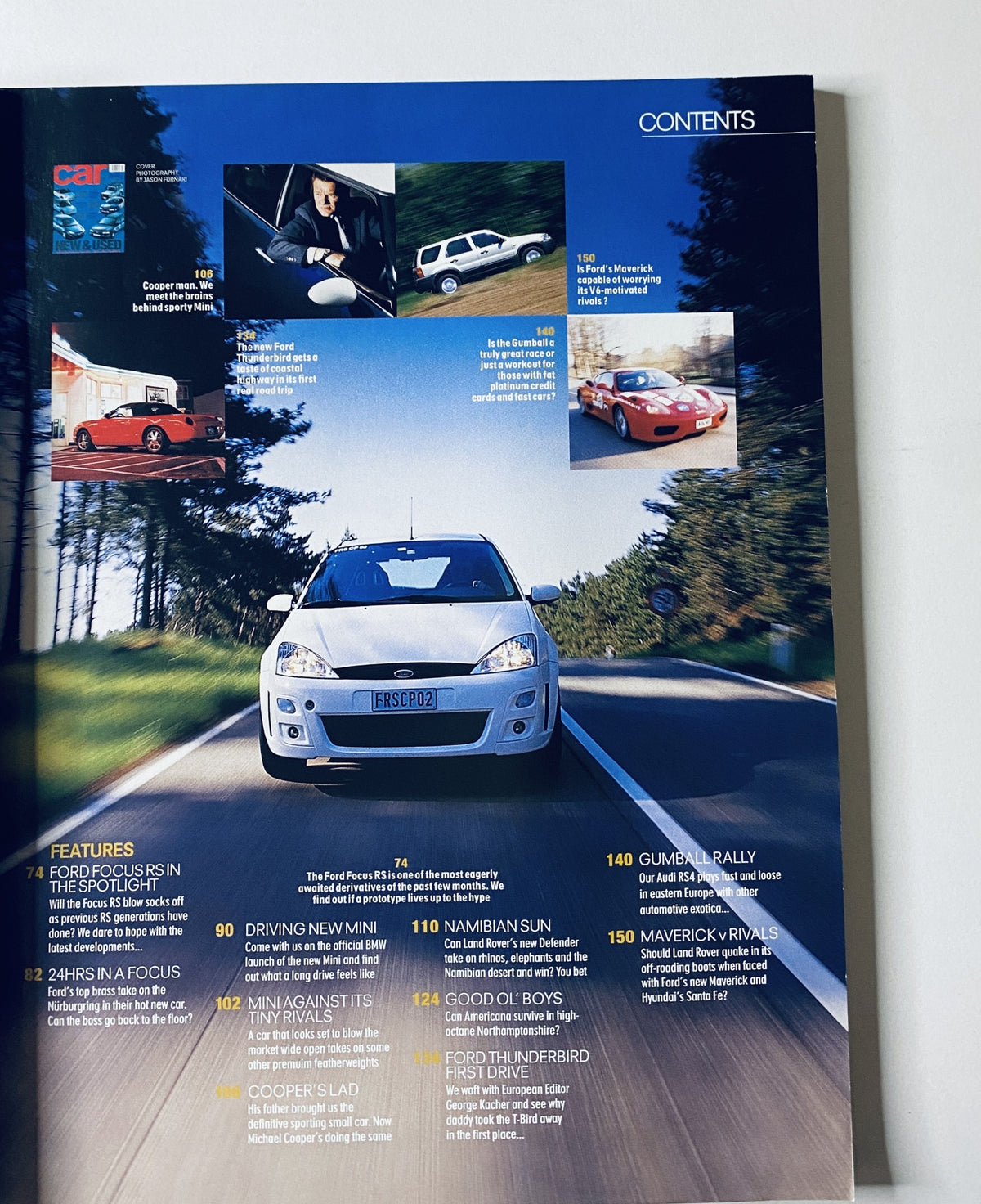 Car Magazine July 2001 featuring content overview with articles on Ford Focus RS, Driving New Mini, and Gumball Rally. Includes an image of a Ford Focus driving through a scenic forest.