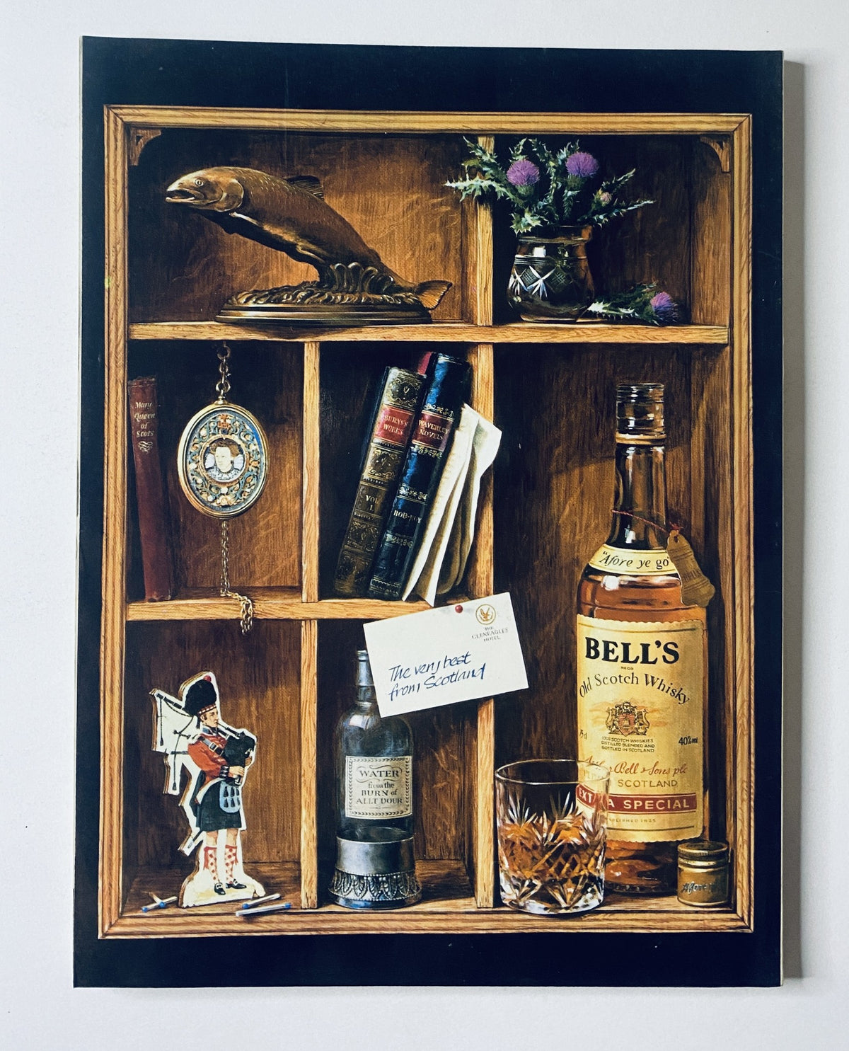 An artistic shelf display featuring a collection of items including a bottle of Bell's Scotch Whisky, a glass, books, a pocket watch, and a Scottish thistle, conveying a nostalgic sentiment along with the caption 'The very best from Scotland!' This image relates to the Car Magazine September 1988, featuring VW Corrado first drive, BMW M3 Evo, and Fiat Strada test.