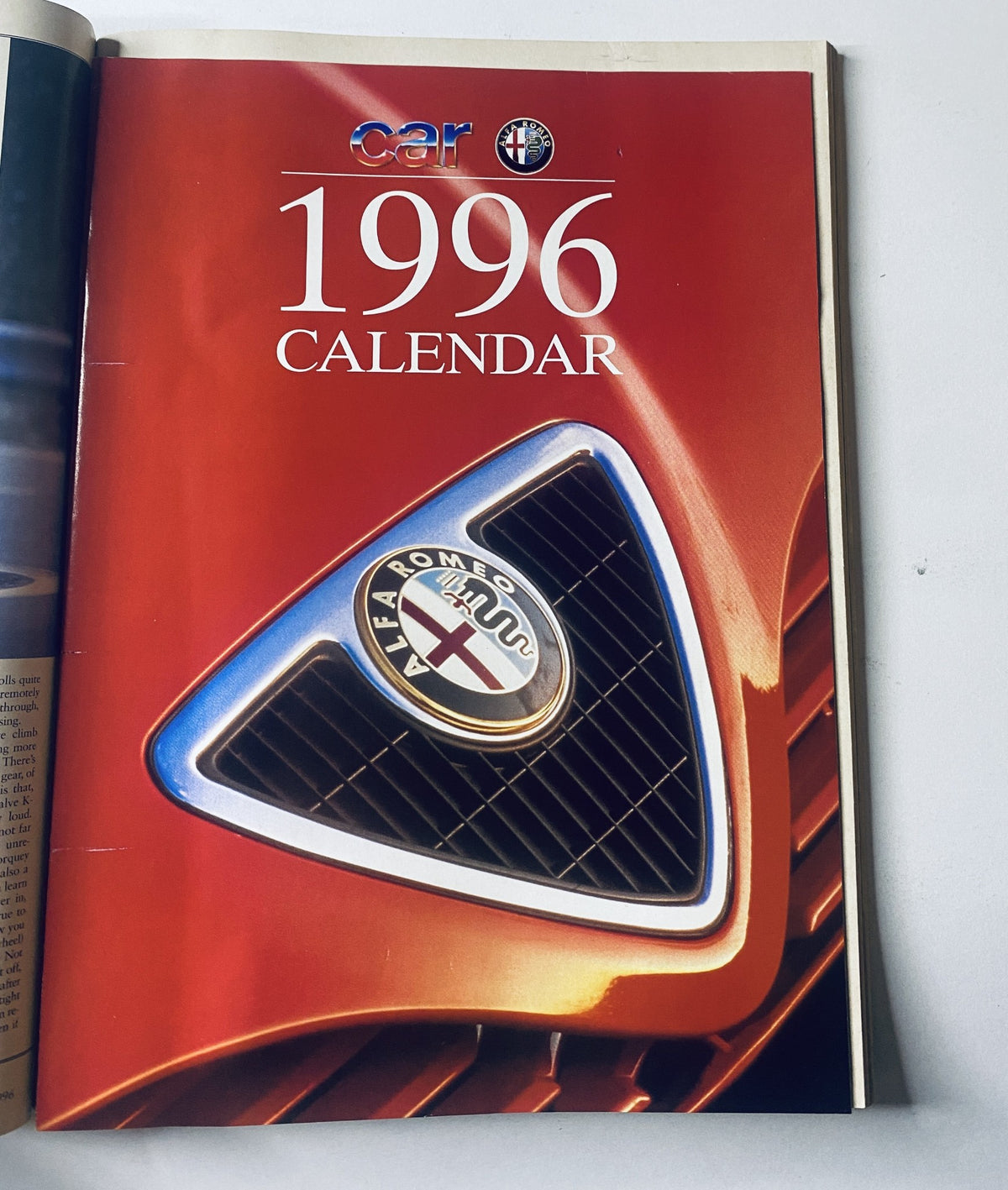Cover page of Car Magazine January 1996 displaying the 1996 Calendar featuring an Alfa Romeo emblem, part of the magazine content.