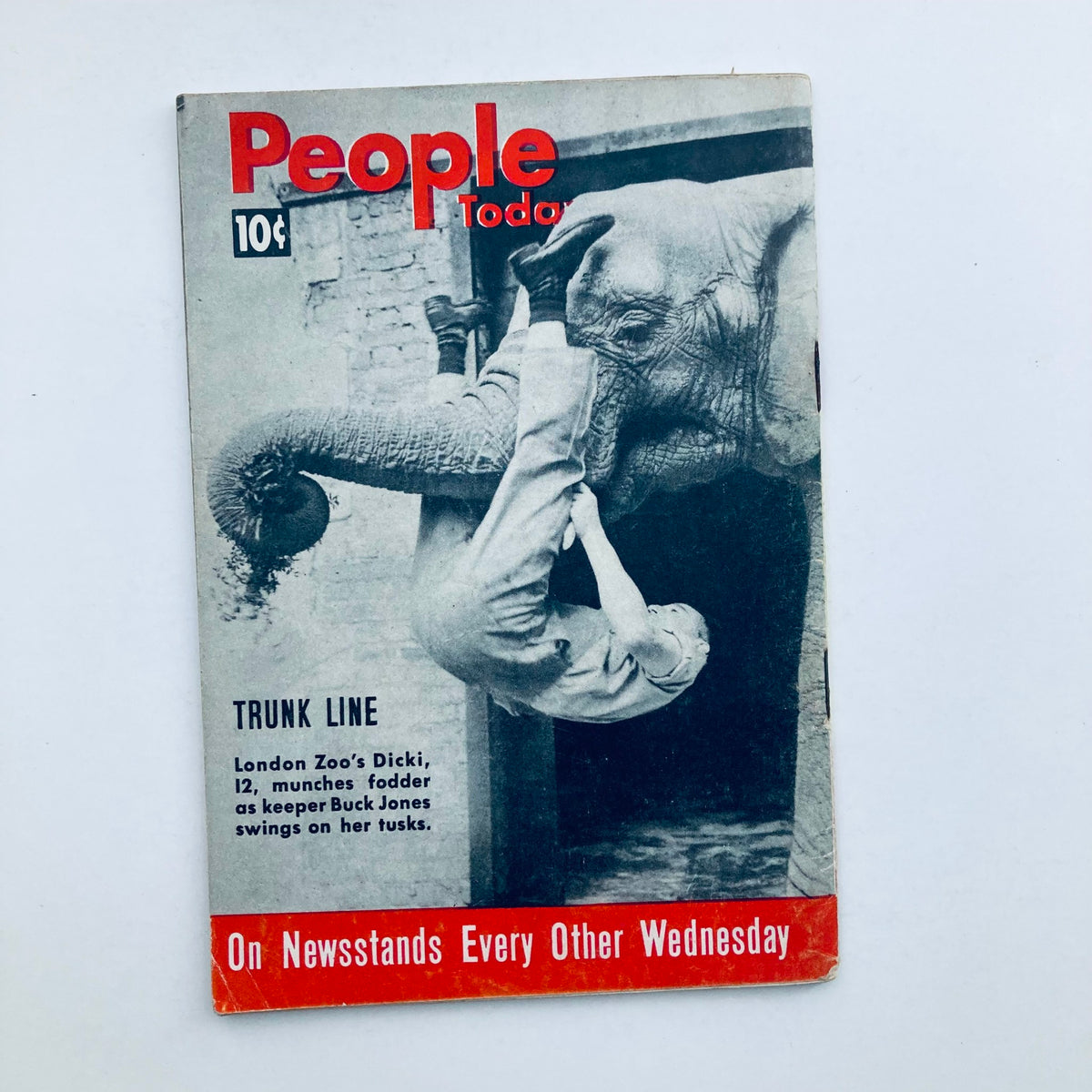 Cover of a different issue of People Today Magazine with an elephant and zookeeper, illustrating the diverse and engaging content of vintage magazines.