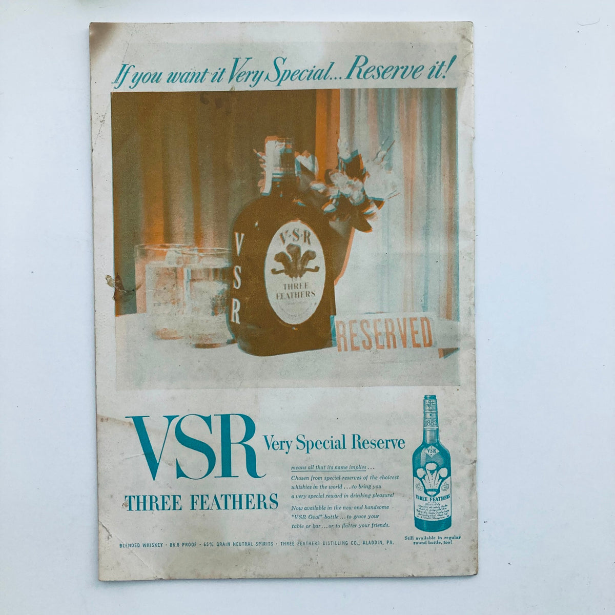 Advertisement for VSR Very Special Reserve whiskey from the vintage 1953 issue of 3-Dimension Entertainment World, highlighting the elegant packaging and promotional message, symbolizing mid-20th century marketing.