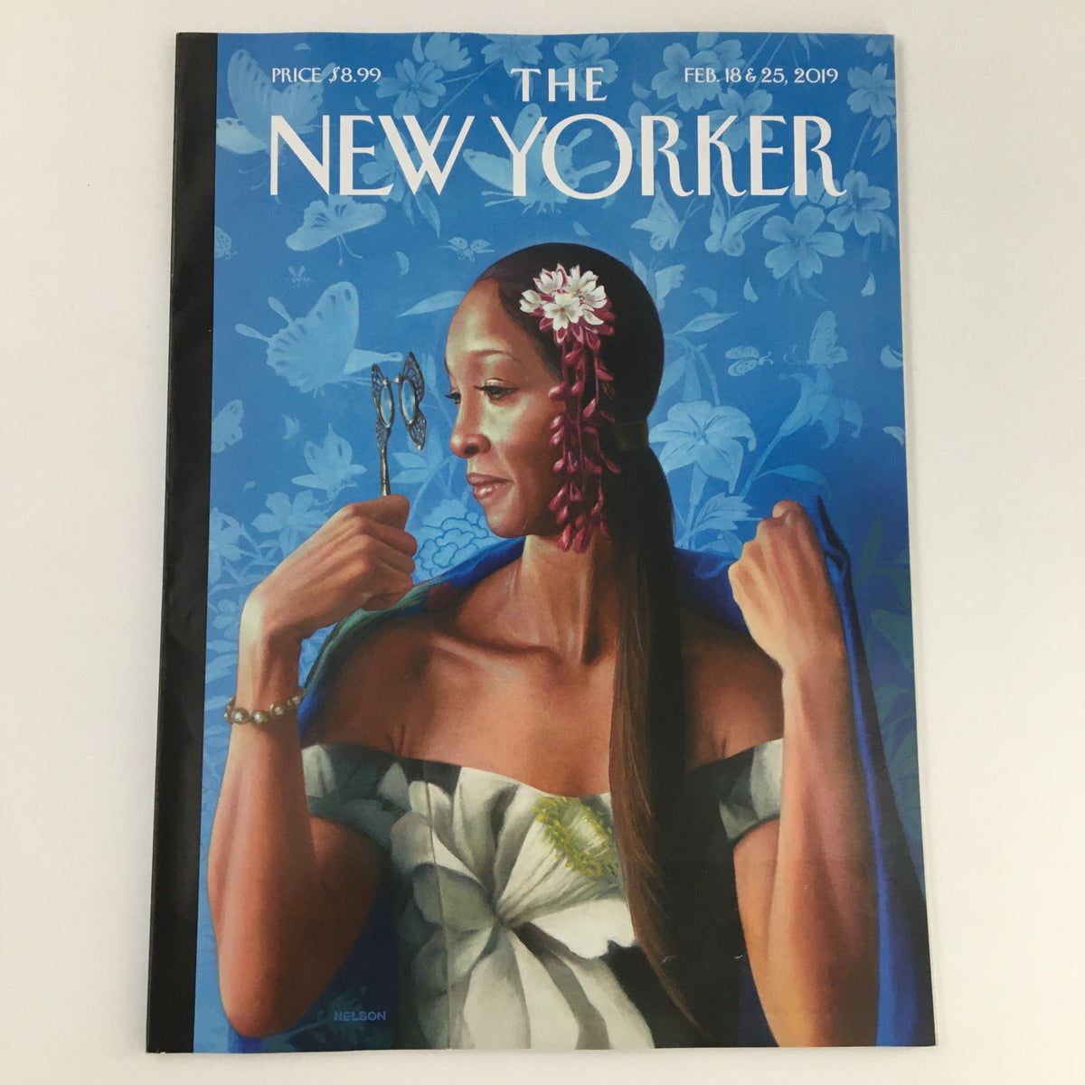 The New Yorker February 18 & 25, 2019 magazine cover featuring a striking portrait by Kadir Nelson, showcasing a woman holding scissors amidst a blue floral background.