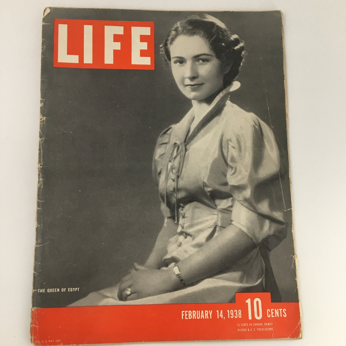 Life Magazine February 14, 1938 cover featuring Queen Farida of Egypt, showcasing her elegance and style, with magazine details including the date and price prominently displayed.