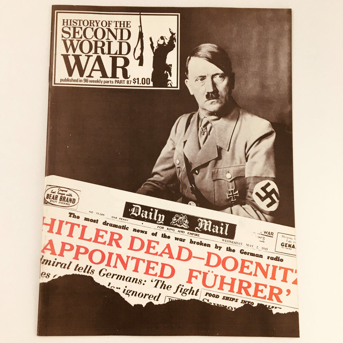 Cover of the vintage magazine 'History of the Second World War Part 87 1974' featuring Adolf Hitler with a newspaper headline stating 'Hitler Dead - Doenitz Appointed Führer'. This edition explores the events surrounding Hitler's death, making it a significant collectible for history enthusiasts.