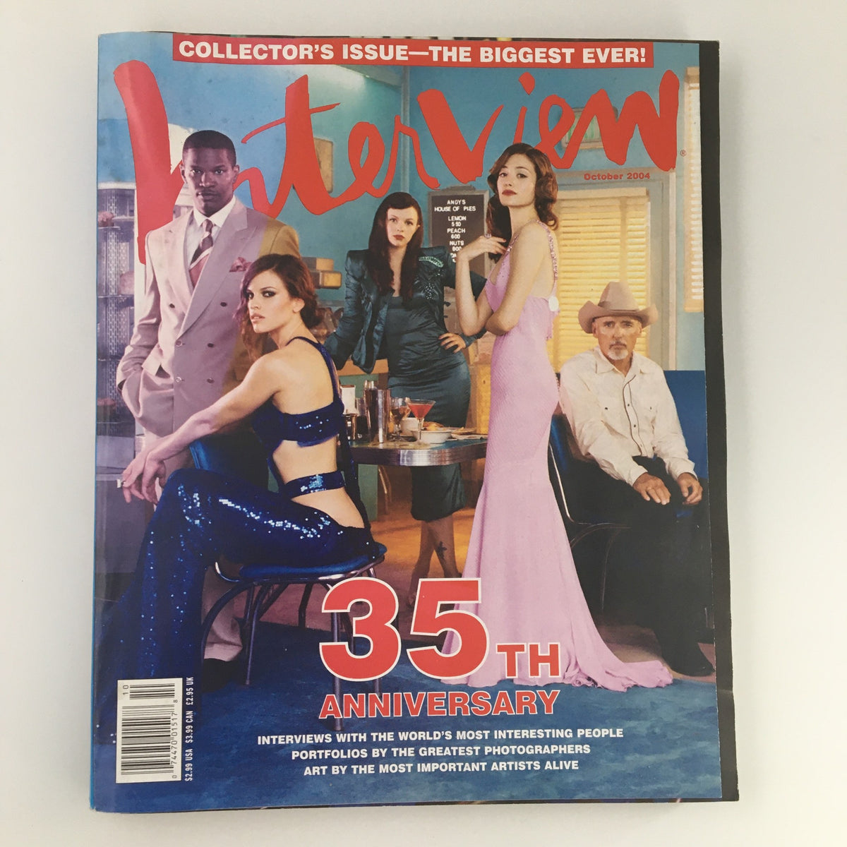 Interview Magazine October 2004 cover featuring Jamie Foxx and Hillary Swank, celebrating the 35th Anniversary, showcasing a vibrant and stylish design with several models posing on the cover.