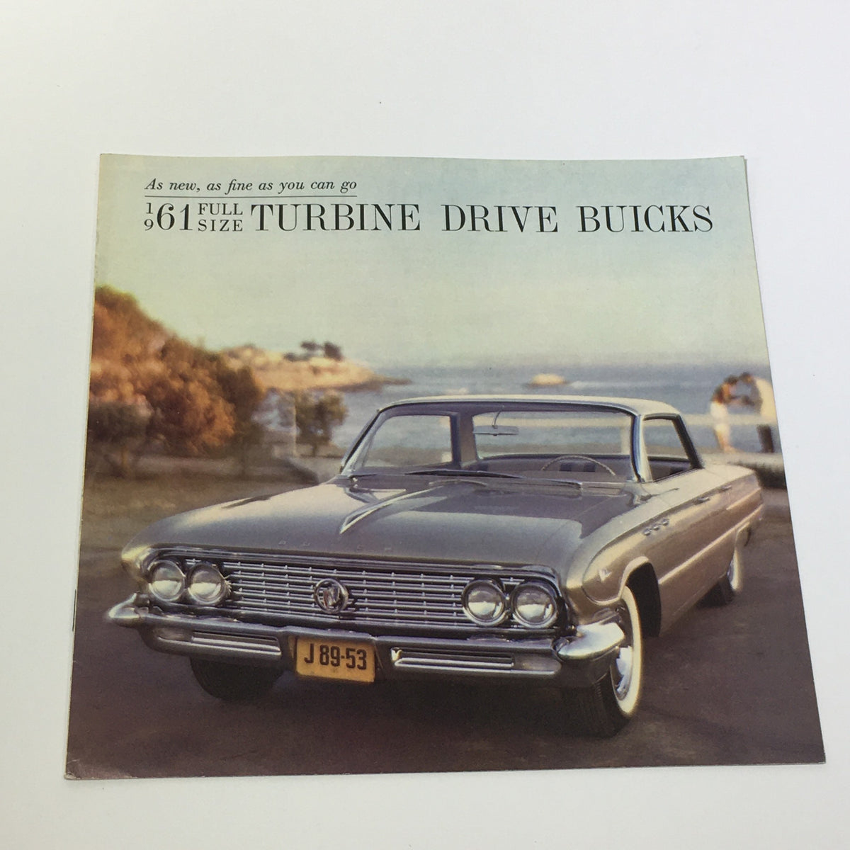 1961 Full Size Turbine Drive Buicks 4-Door 2-Door Sedan Car Sale Brochure featuring a classic Buick sedan set against a scenic backdrop.