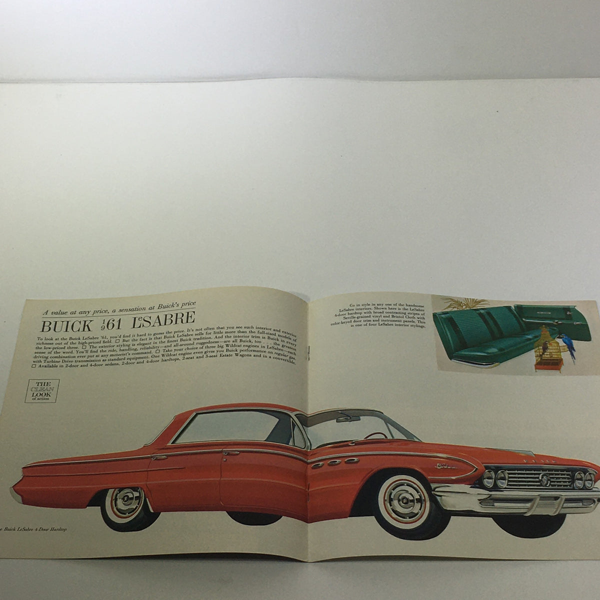 1961 Full Size Turbine Drive Buicks 4-Door and 2-Door Sedan Car Sale Brochure with an illustration of a Buick '61 LeSabre in vibrant red color.