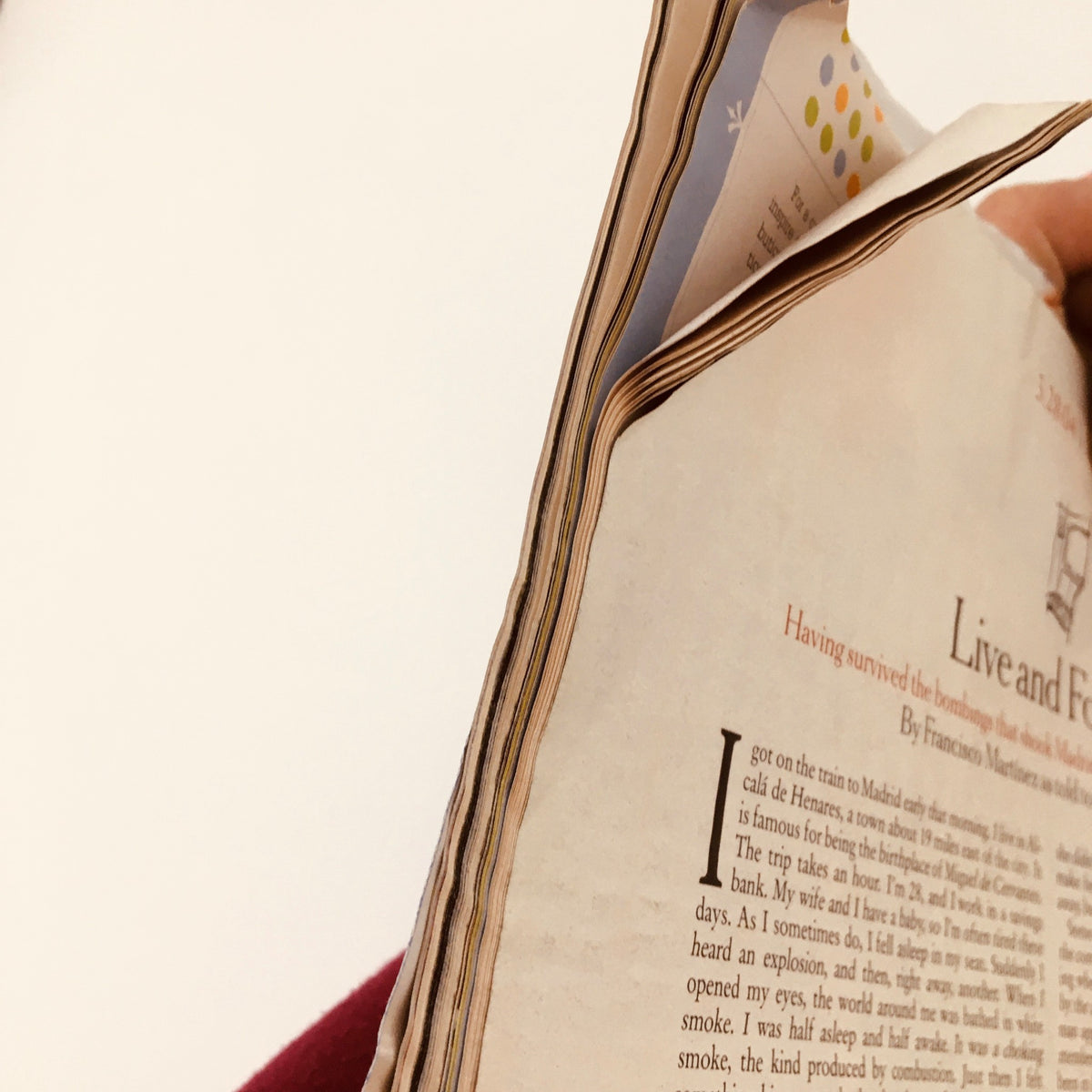 A close-up view of the pages of The New York Times Magazine March 28 2004 showing the edges and slight wear over time.