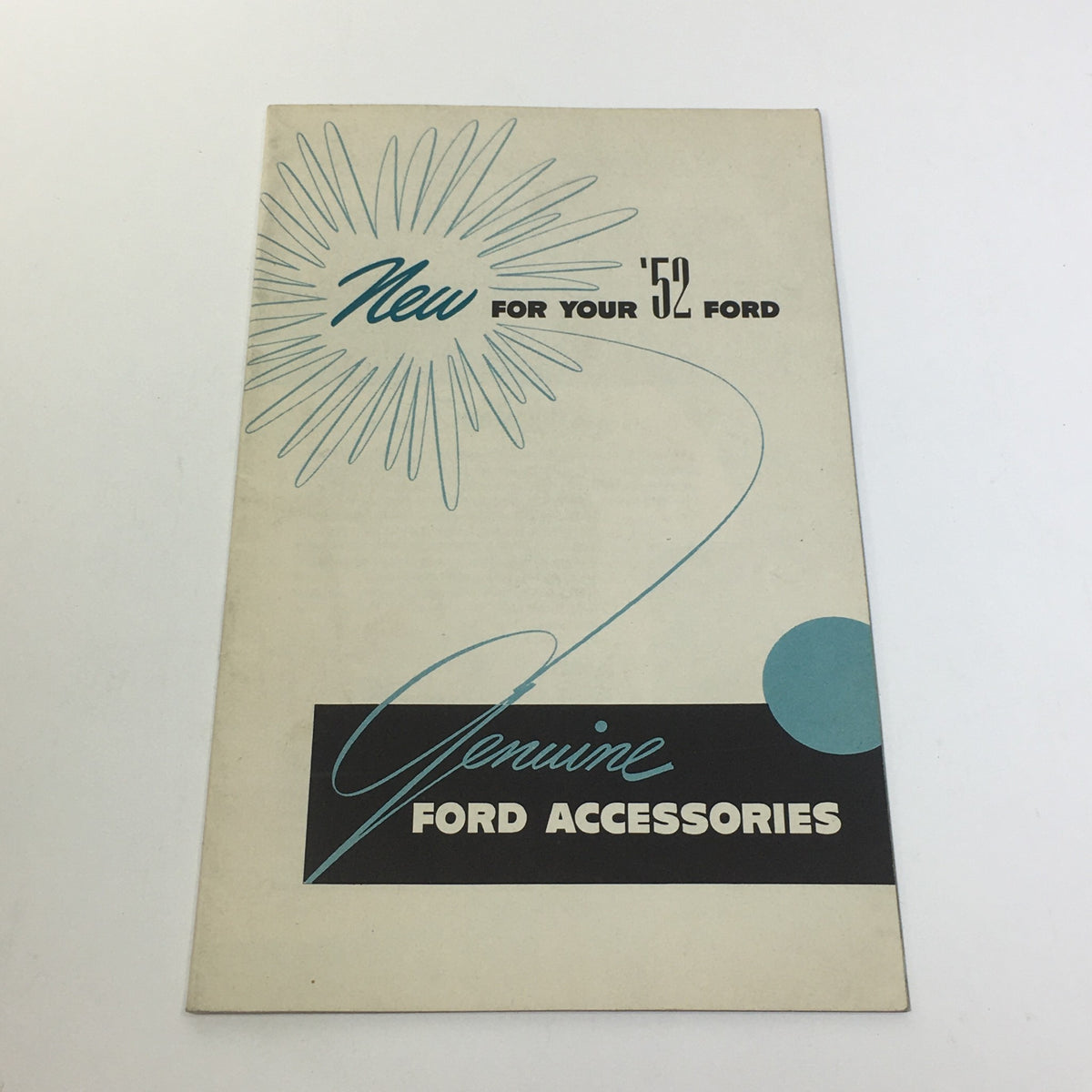 Cover of 1952 Ford Genuine Accessories Magic Air System Defroster Car Catalog Brochure showcasing a decorative design including text and graphics related to Ford accessories.