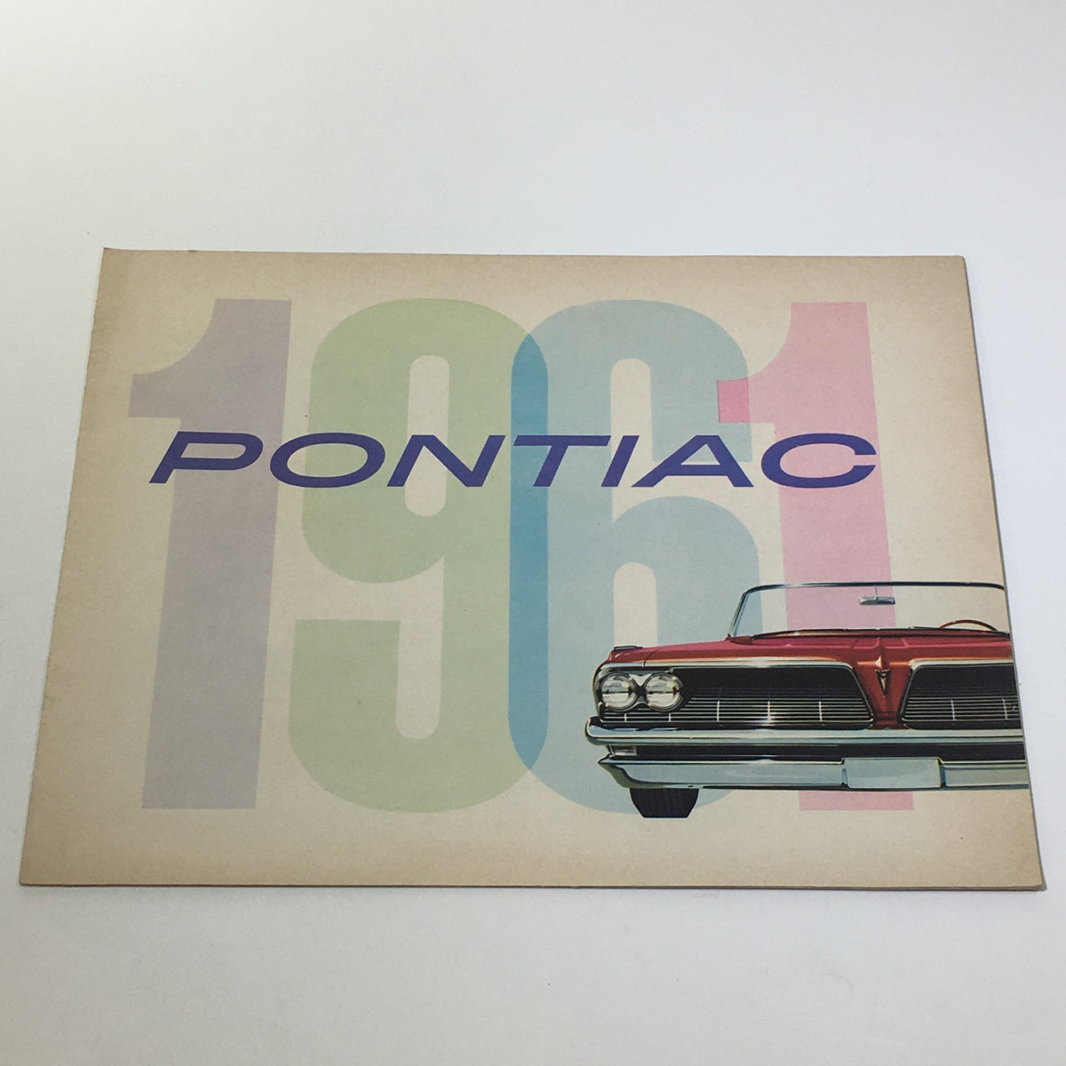 1961 Pontiac Catalina Sport 2-Door Coupe Type V-8 Hydra-Matic Engine Car Catalog cover featuring a vintage design and classic car illustration.