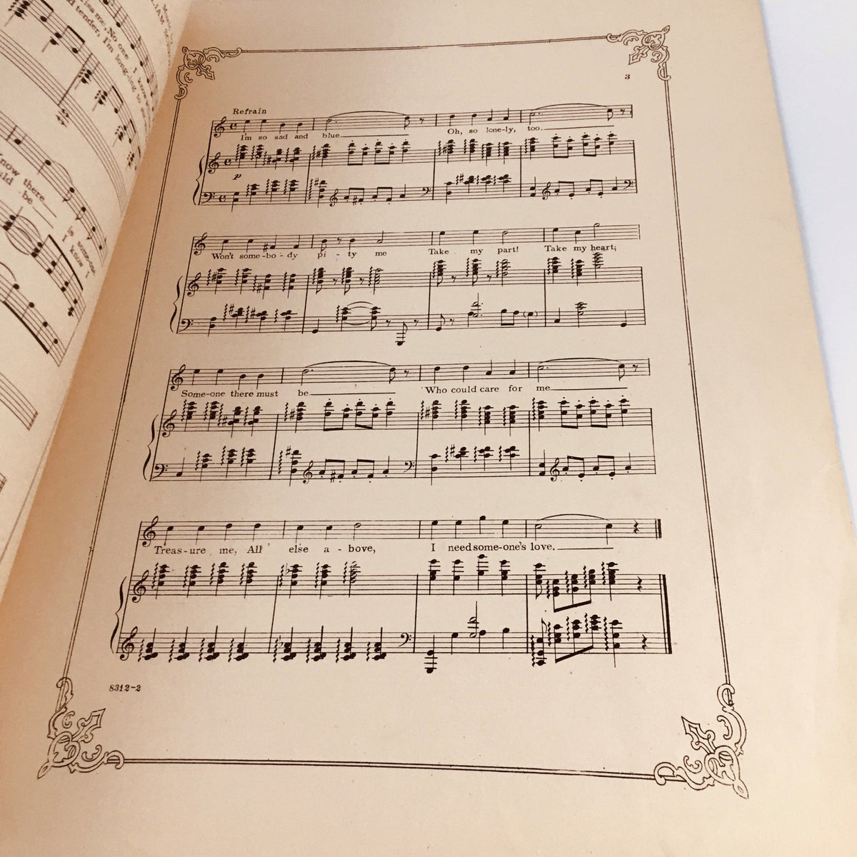 Interior page of the vintage magazine 'I Need Someone's Love', displaying sheet music with musical notes from the early 20th century, showcasing the work of William Schroeder.