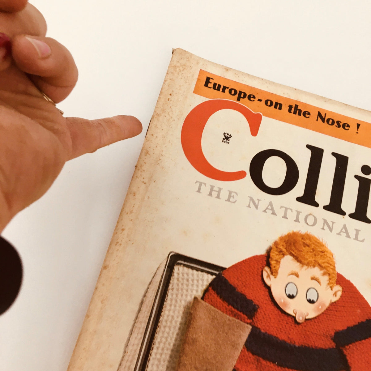 Close-up of the December 1, 1934 issue of Collier's Magazine highlighting 'Europe-on the Nose!' by W.B. Courtney.