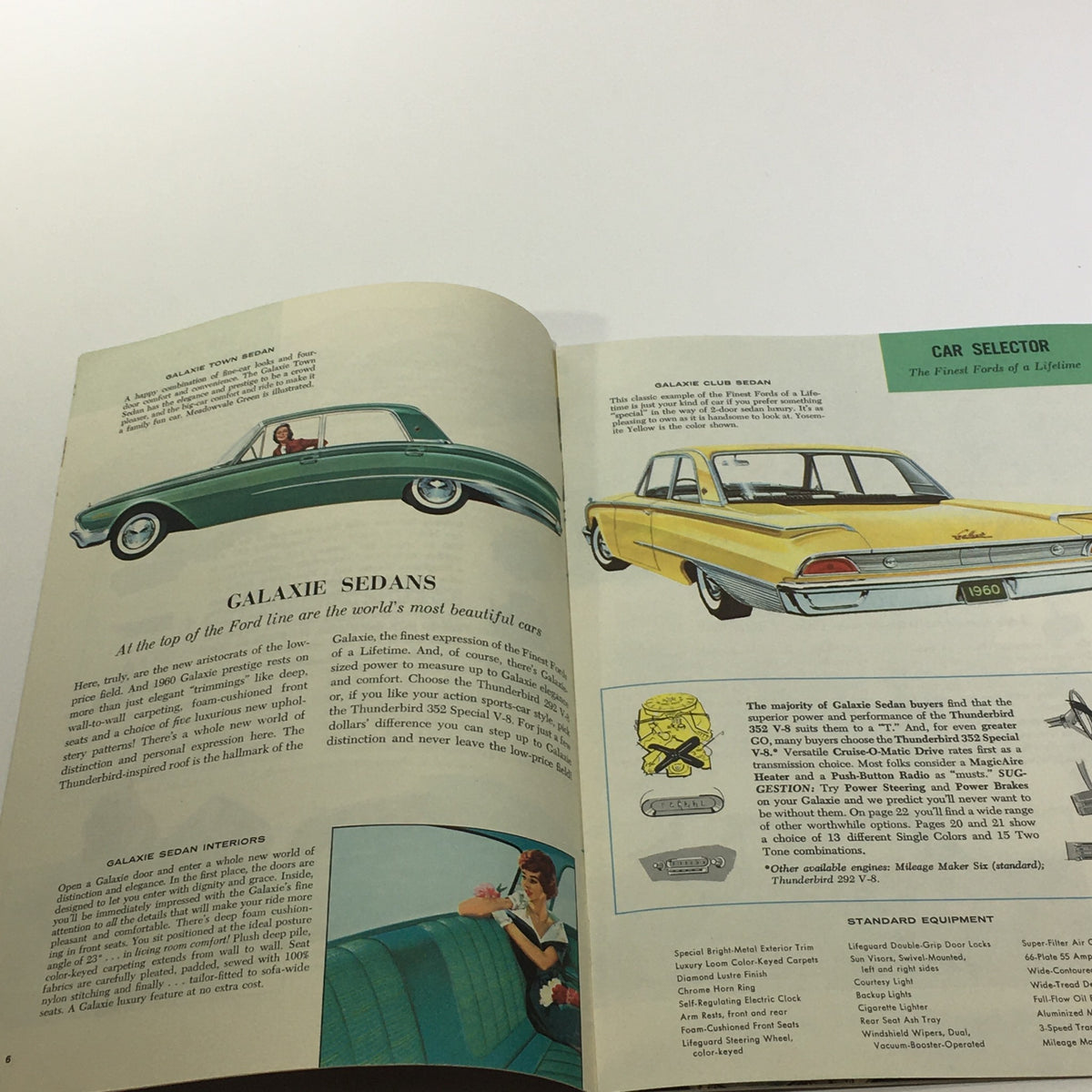 1960 Ford and Ford Wagons Galaxie Sedans Thunderbird 352 Special V8 Car Brochure showcasing the Galaxie Town Sedan and Club Sedan with colorful illustrations and interior designs.