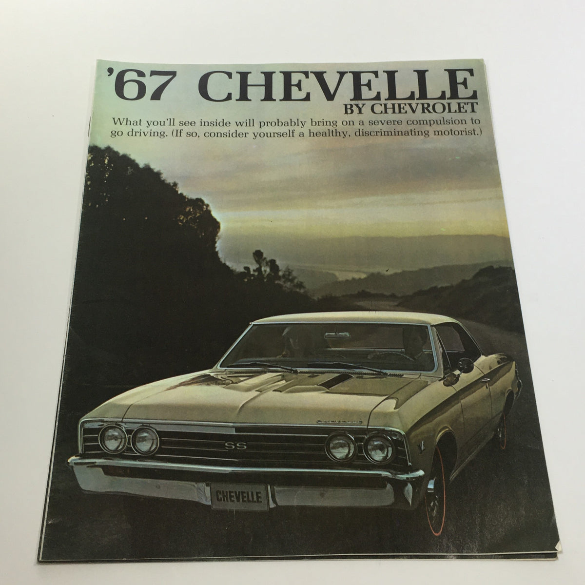 Brochure for the 1967 Chevelle 300 by Chevrolet featuring a front image of the car, highlighting its sleek design and classic appeal.