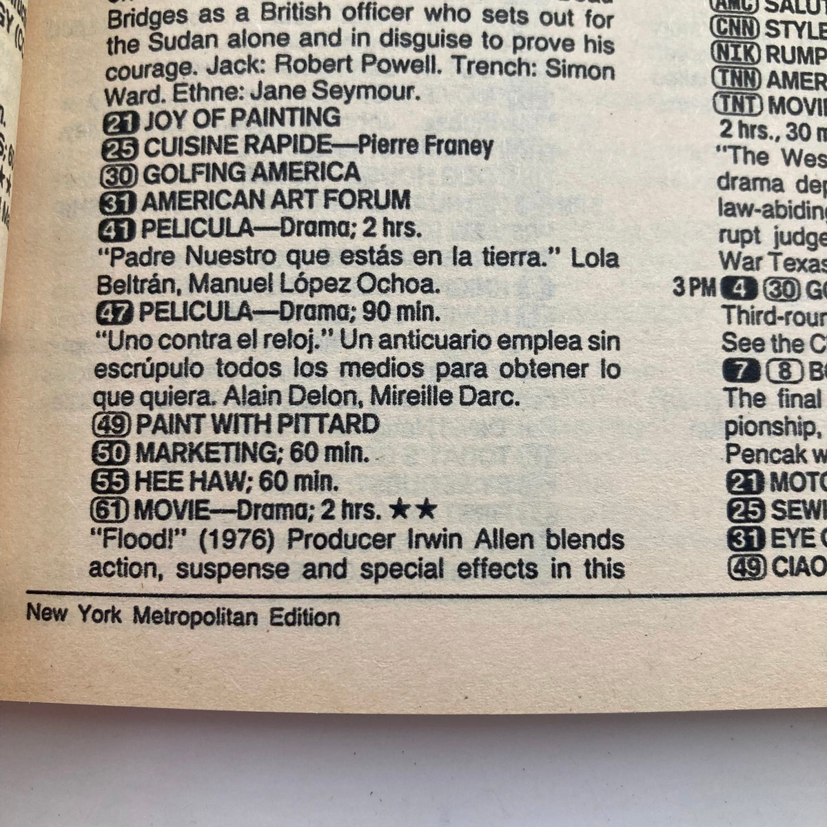 Inside page of TV Guide Magazine from March 30, 1991, showcasing programming listings, including a drama 'Flood!' and various shows relevant to the New York Metropolitan Edition.