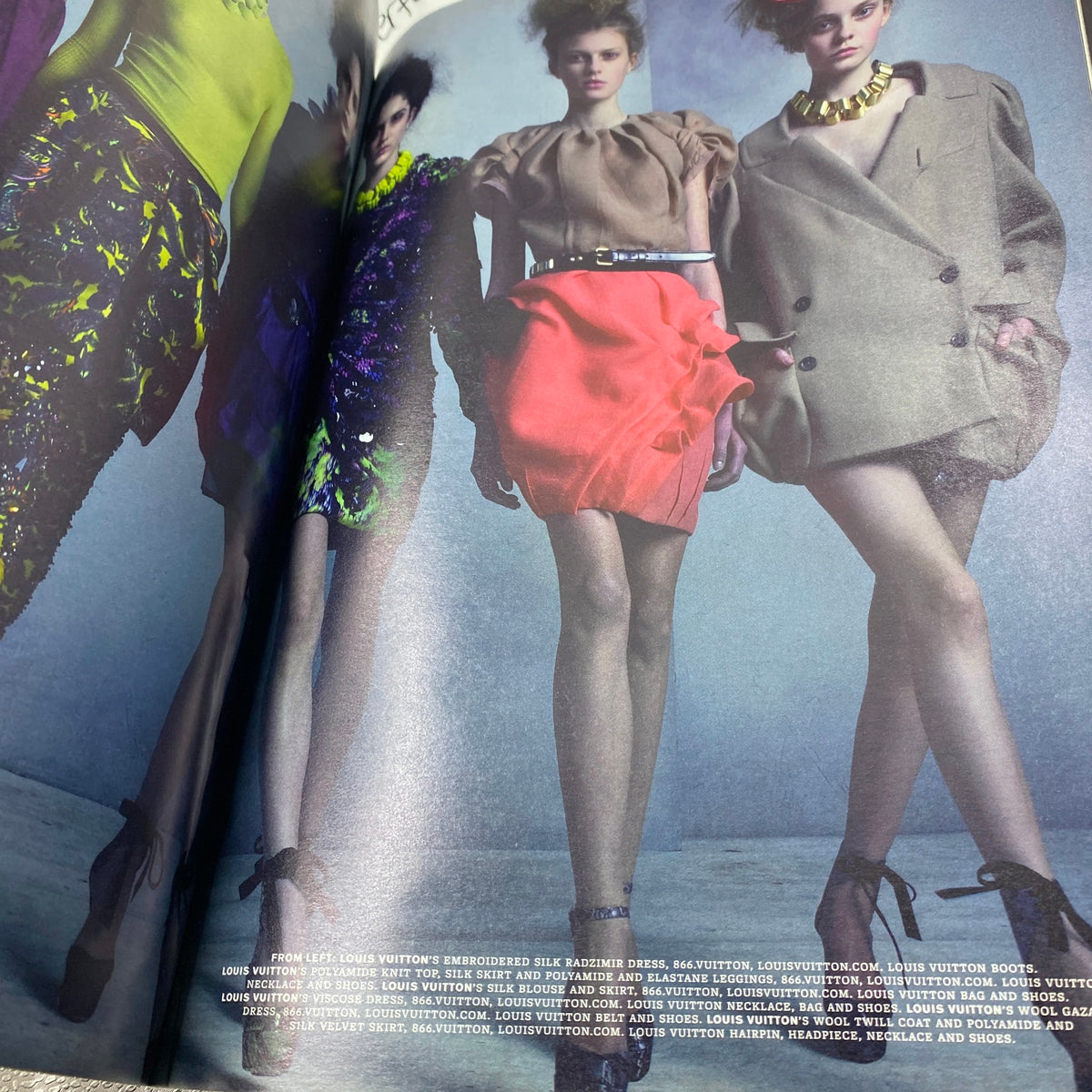 Fashion editorial from W Magazine June 2009 featuring models in stylish outfits including embroidered silk dresses and bold accessories, showcasing contemporary fashion trends.