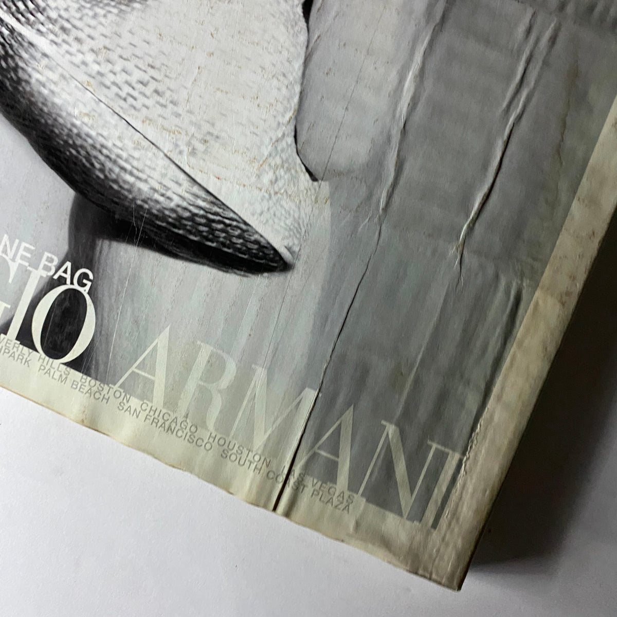 Close-up of a Giorgio Armani bag from W Magazine March 2009, highlighting the elegant design and textures, capturing the essence of high fashion.