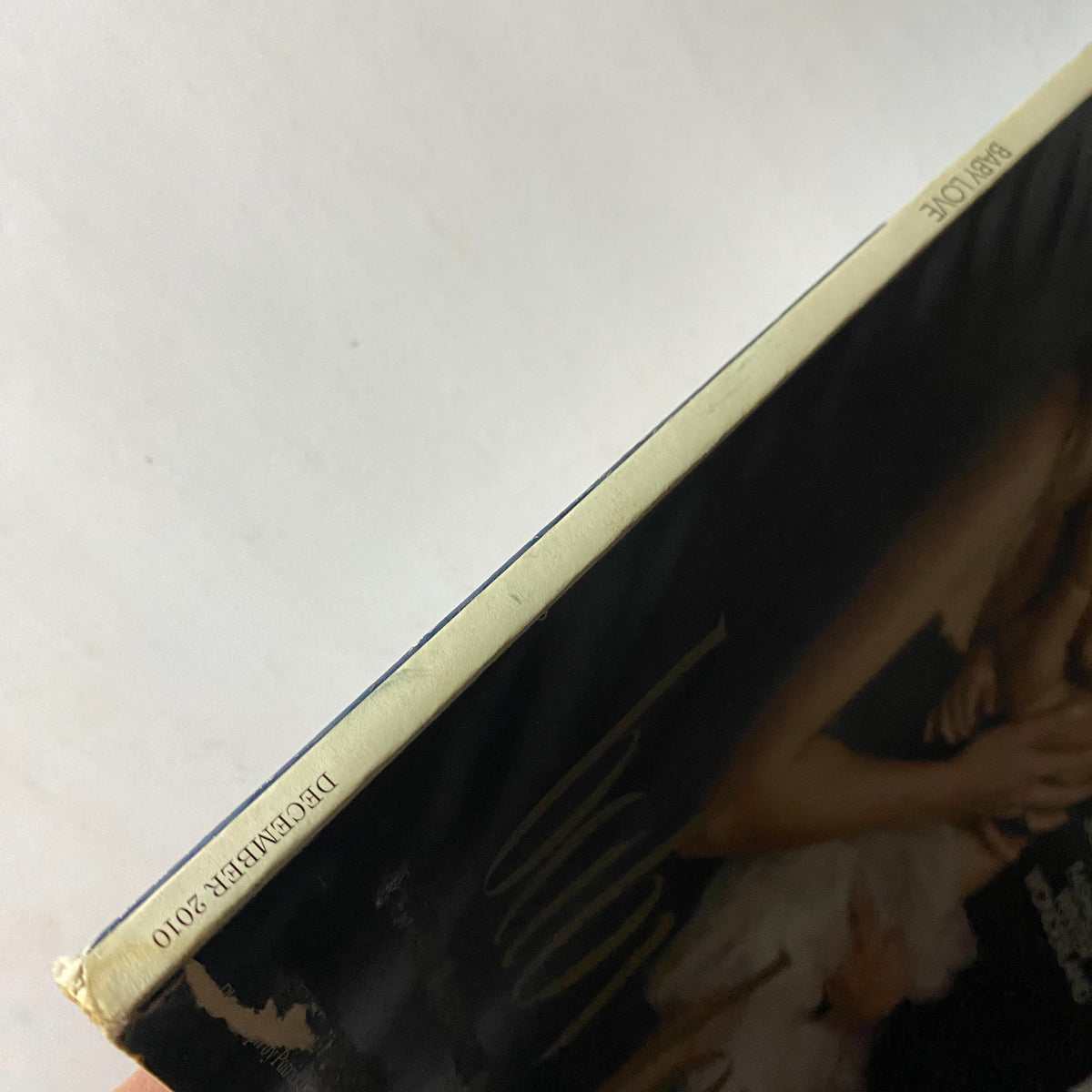Spine view of the W Magazine December 2010 issue, highlighting the publication date and vintage appeal.