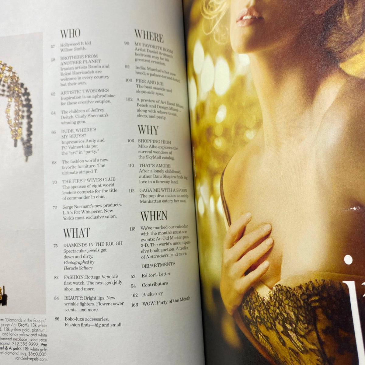 Interior page of W Magazine December 2010 showing contents, illustrating fashion and beauty articles from that era.