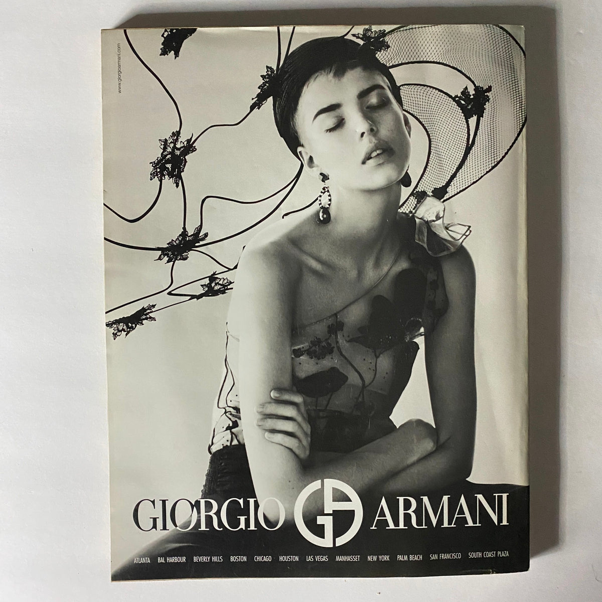 W Magazine February 2007 issue featuring Nicole Kidman and Daniel Craig cover highlights a striking editorial layout of a Giorgio Armani advertisement, showcasing a fashion-forward model in an artistic pose.