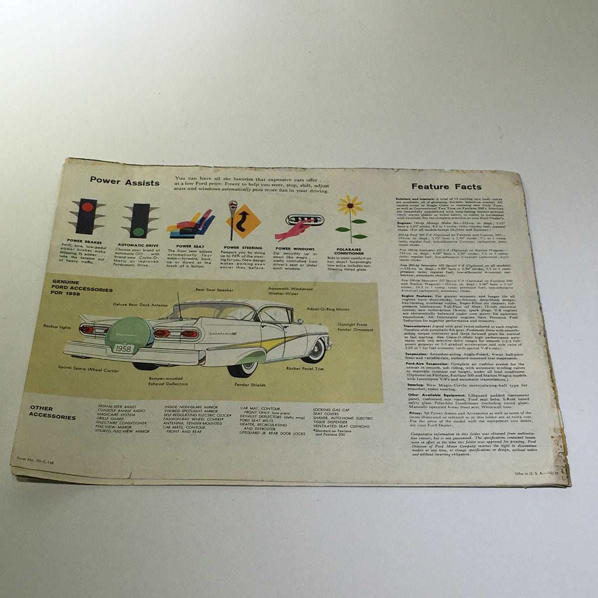 Back page of the 1958 Ford Thunderbird & Skyliner Wagon Series V-8 Engine Car Catalog Brochure featuring lists of power assists and accessories.
