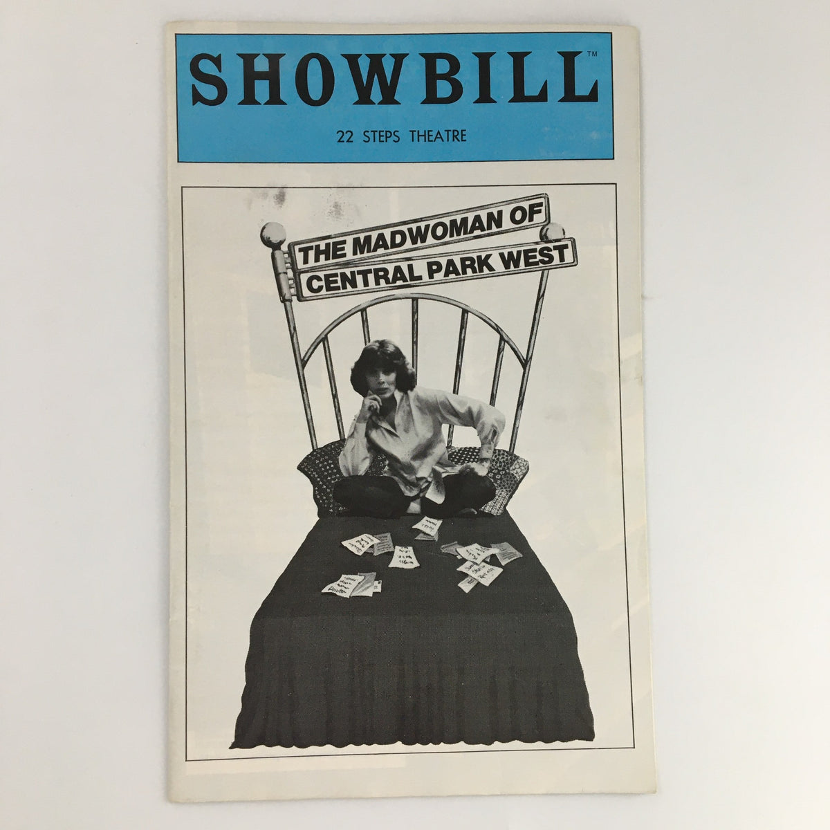 1979 Showbill for 'The Madwoman of Central Park West' featuring Phyllis Newman, showcasing the cover design with a black and white image of a woman sitting on a bed.