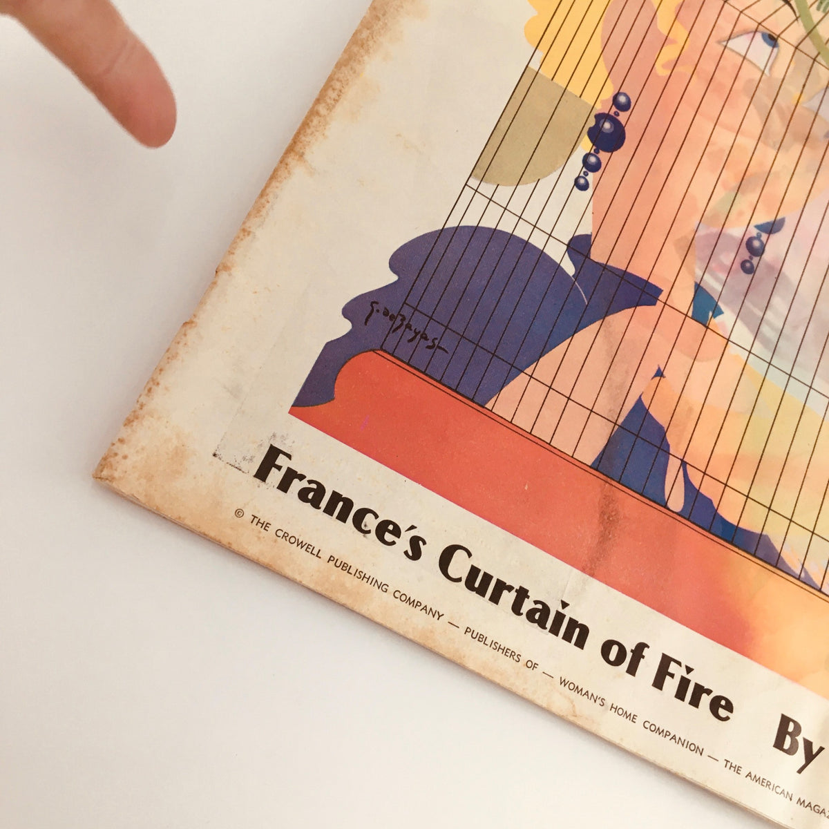 Side view of VTG Collier's Magazine June 13, 1936, showcasing a bird cage and an illustration of a woman, along with visible wear and age.