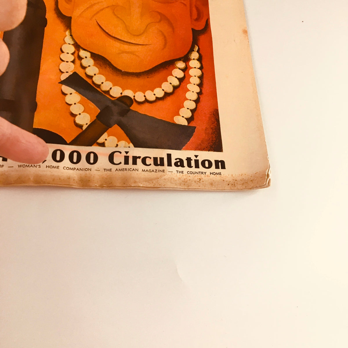 Close-up of the back cover of the VTG Collier's Magazine from November 24, 1934, showing illustration details alongside a description of its circulation.