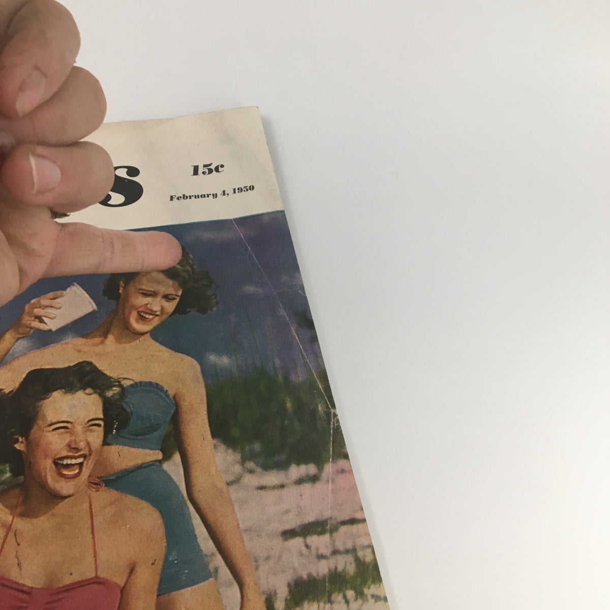 Close-up of the vintage Collier's Magazine cover from February 4, 1950, highlighting the title "Mr. Welfare State Himself" and a smiling woman in swimwear.