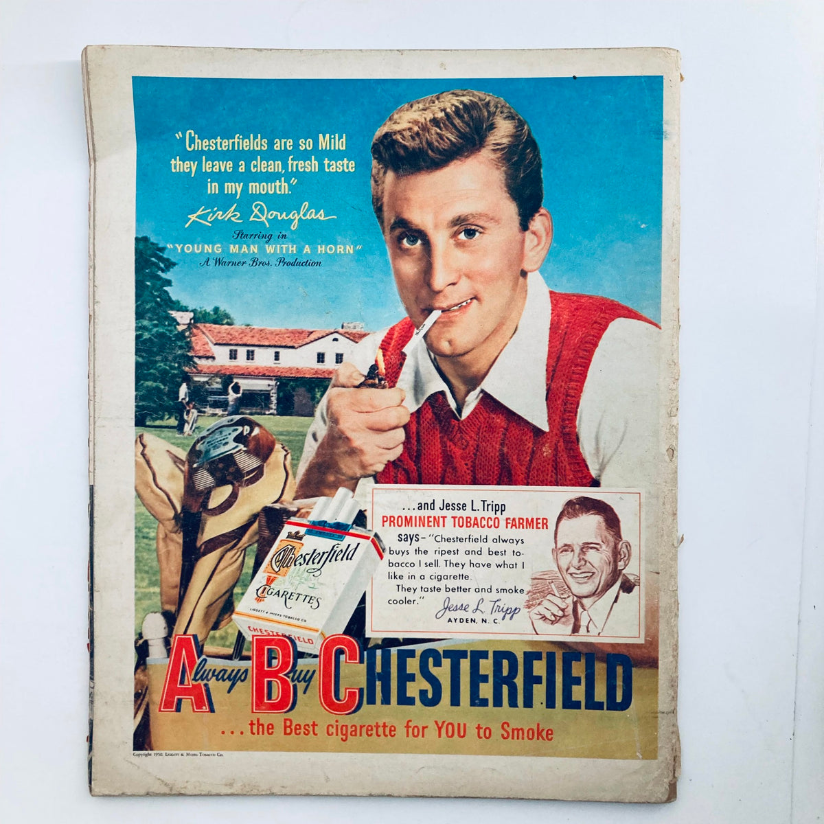 Back cover advertisement of Chesterfield cigarettes featuring Kirk Douglas, from Look Magazine, March 14, 1950, Volume 14, Number 6, promoting Chesterfield's mild flavor.