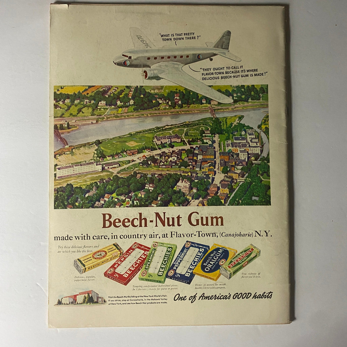 Beech-Nut Gum advertisement featured on the cover of Life Magazine August 28, 1939, showcasing colorful gum packaging and an aerial view of Flavor-Town, N.Y. This vintage magazine edition delves into historical insights and cultural commentary from the pre-World War II era.