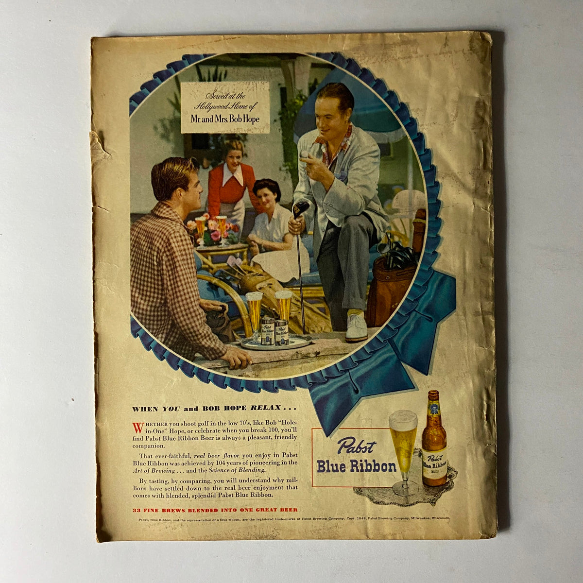 Back cover of Sport Magazine July 1948 featuring an advertisement for Pabst Blue Ribbon beer, illustrating 1940s style and culture.
