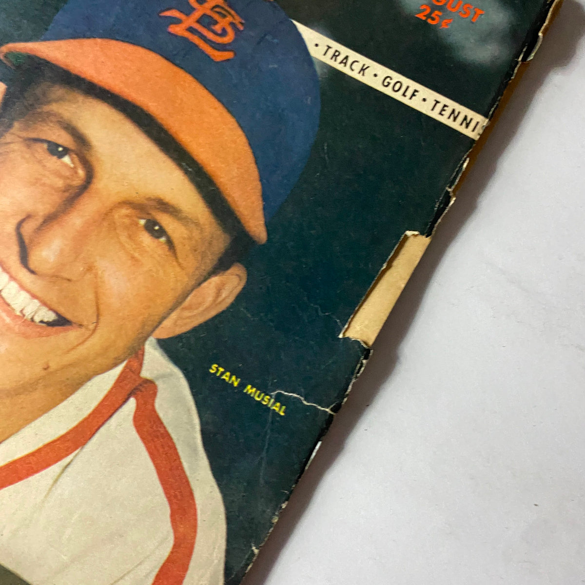 Close-up of the cover of Sport Magazine August 1948 with Stan Musial, showcasing the magazine's title and date, reflecting its historical significance for sports enthusiasts.