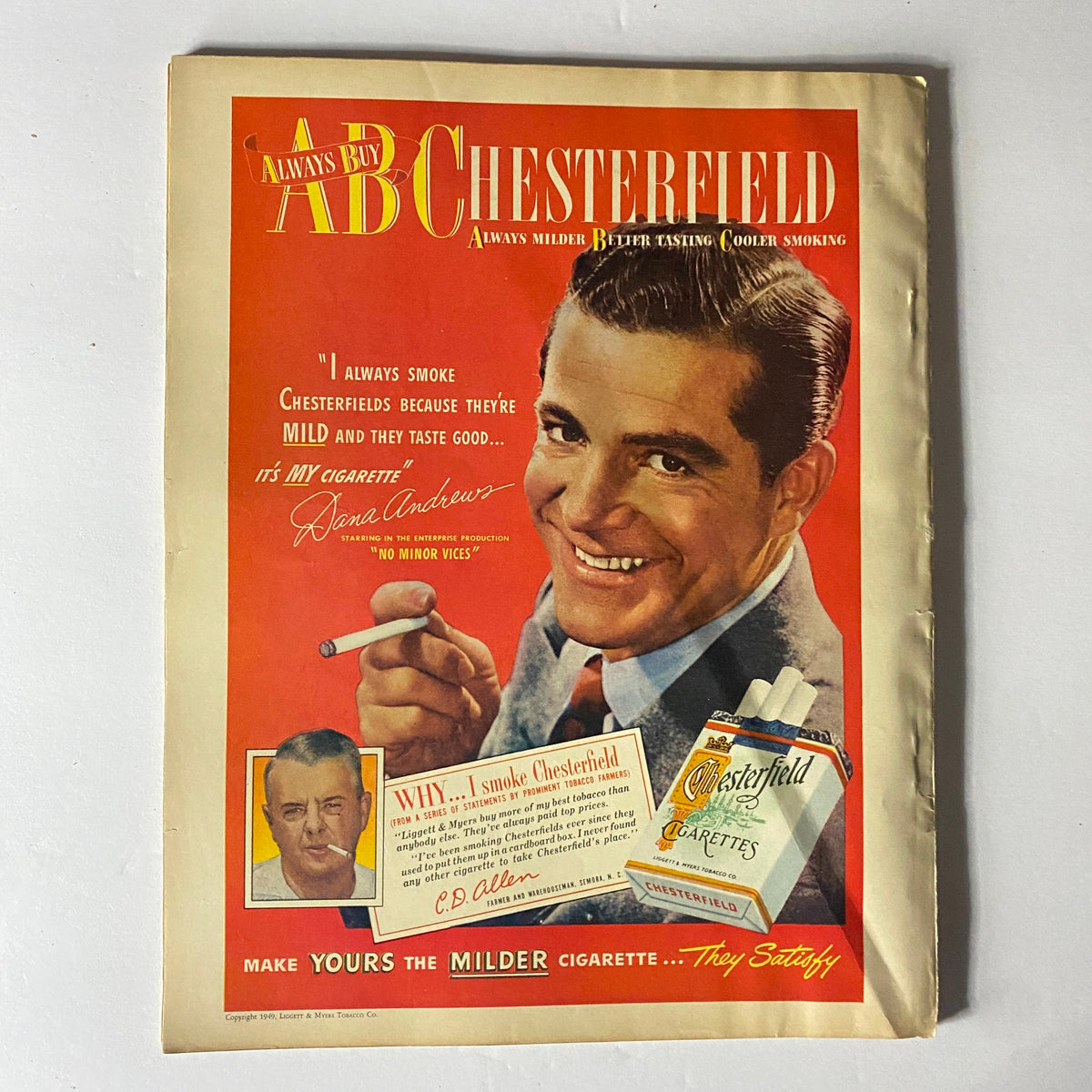 Advertisement page from Sport Magazine January 1949 featuring Chesterfield cigarettes, highlighting mid-20th century marketing alongside sports-related content.