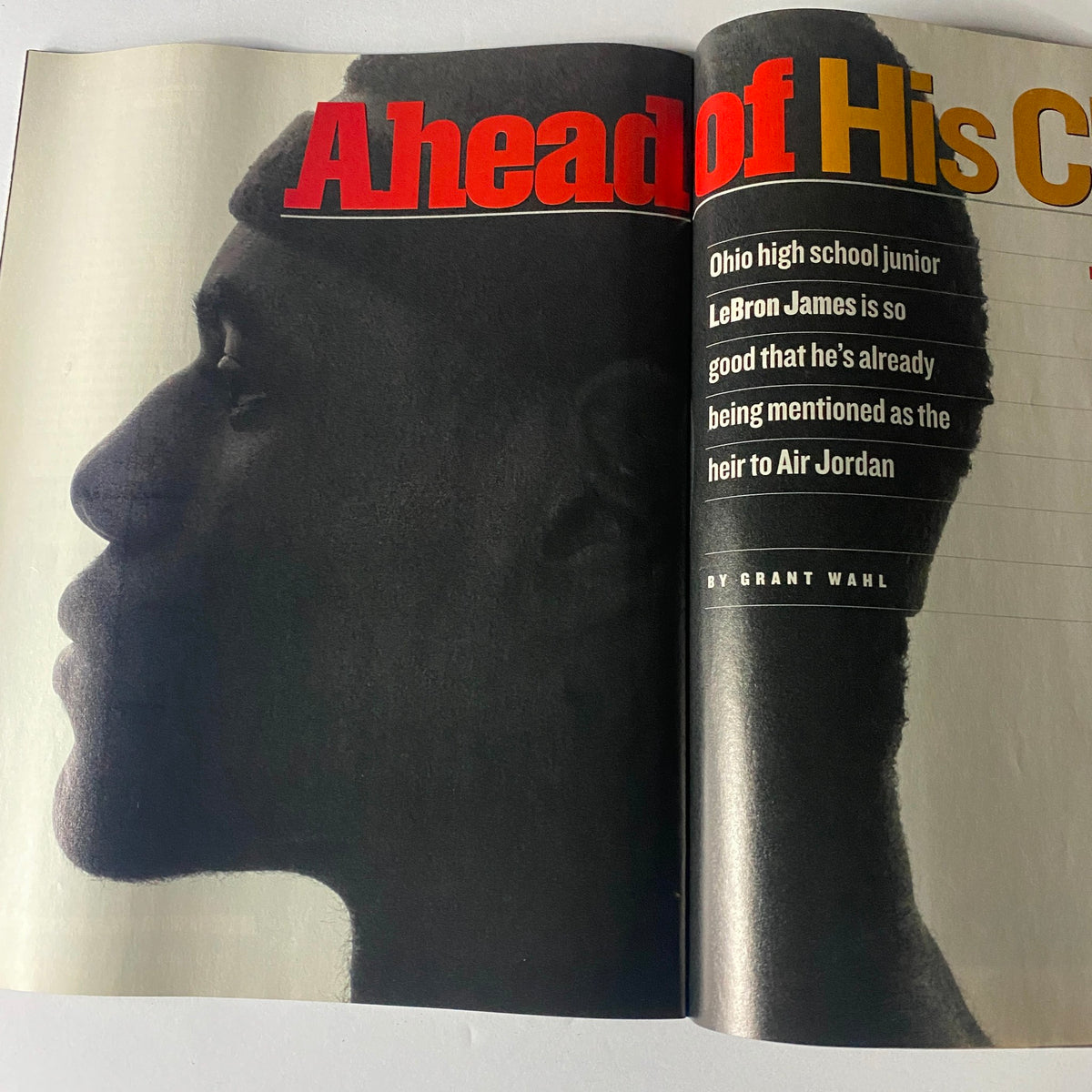 Inside page of Sports Illustrated February 18, 2002 featuring an article titled 'Ahead of His Class' discussing LeBron James's remarkable talent and basketball legacy.