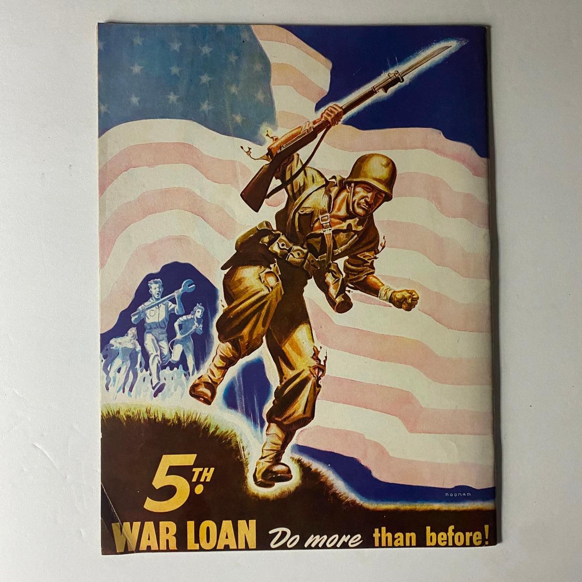 Douglas Airview Magazine June 1944 cover featuring a soldier charging forward with a rifle against a backdrop of the American flag, symbolizing wartime and military efforts. The title highlights the 5th War Loan initiative with the slogan 'Do more than before!'
