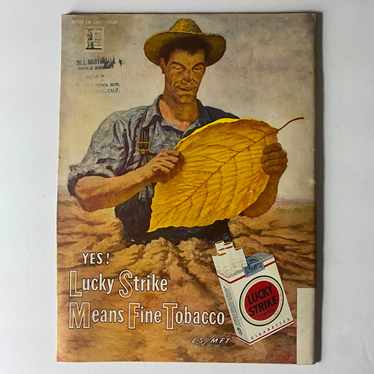 Cover of Life Magazine August 14, 1944, depicting a farmer inspecting a large tobacco leaf, symbolizing the advertisement for Lucky Strike cigarettes.