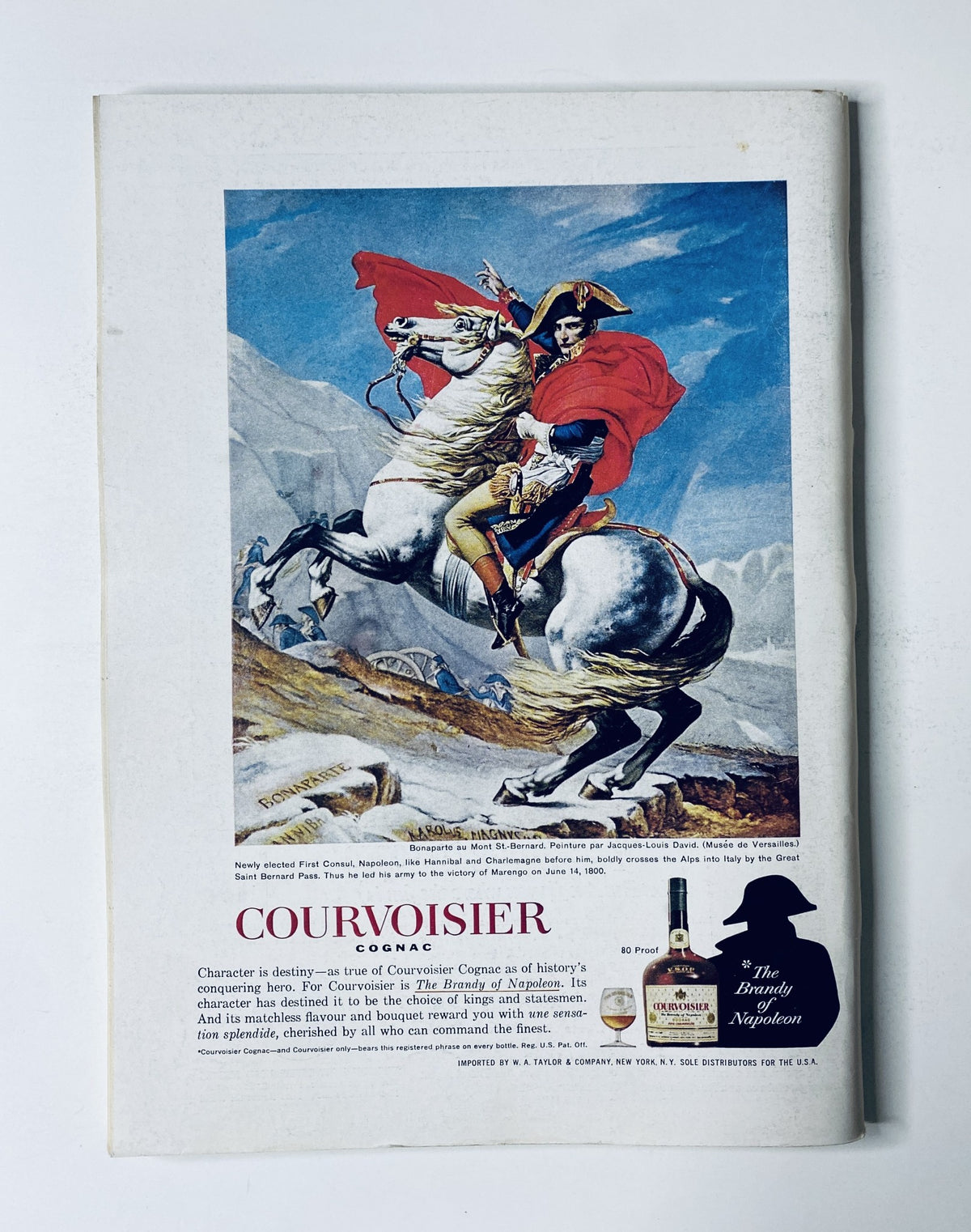 Back cover of The New Yorker Magazine October 10, 1964, advertising Courvoisier Cognac with a colorful illustration of a historical figure on horseback.